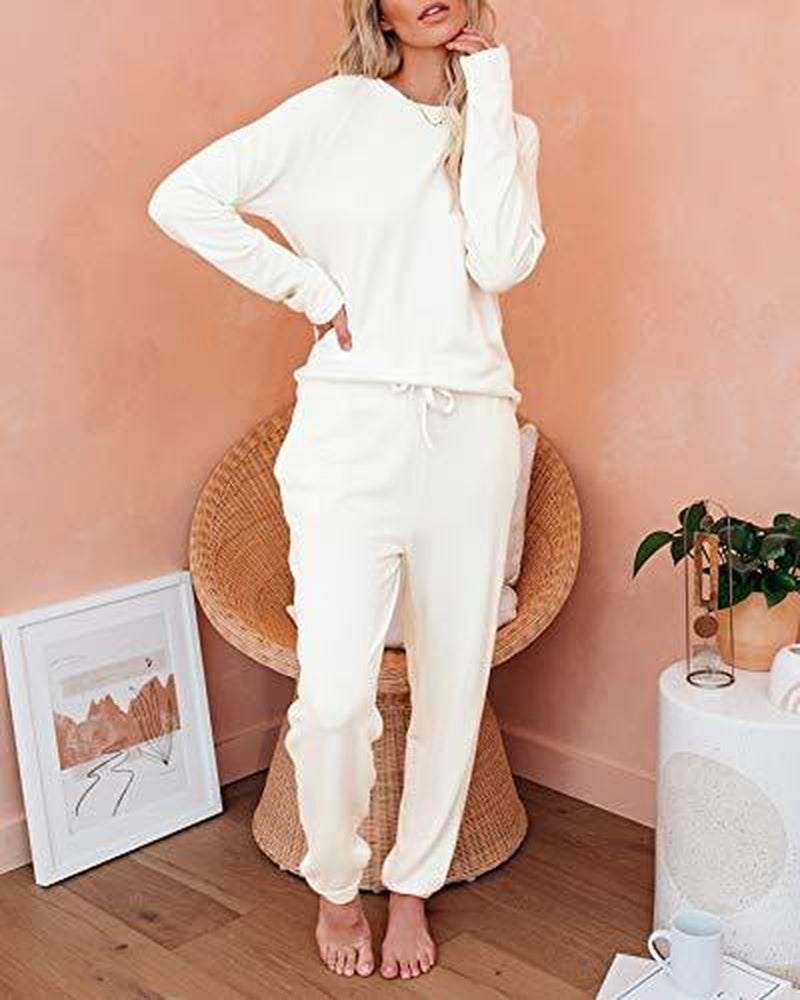 FISOEW Women'S Solid Sweatsuit Set 2 Piece Long Sleeve Pullover and Drawstring Sweatpants Sport Outfits Sets Viral Knit Set Two Piece Set Women Two Piece Outfits Matching Sets Women #Tiktokshopblackfriday #Tiktokshopcybermonday